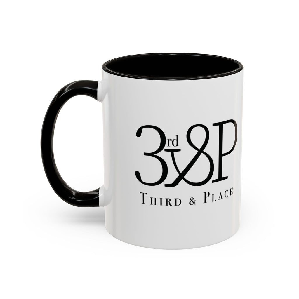 White mug with black interior and handle, featuring text on a white background