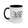 White mug with black interior and handle, featuring text on a white background