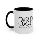 White mug with black interior and handle, featuring text on a white background
